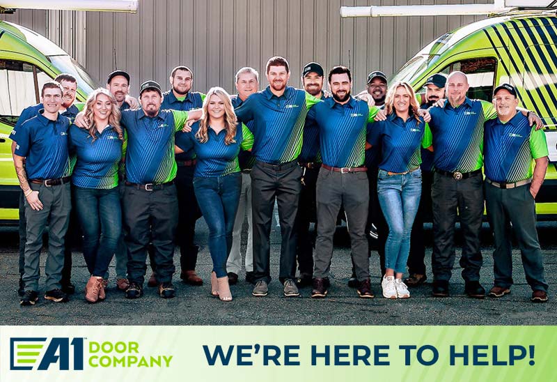 technician giving new garage door estimate to happy customer